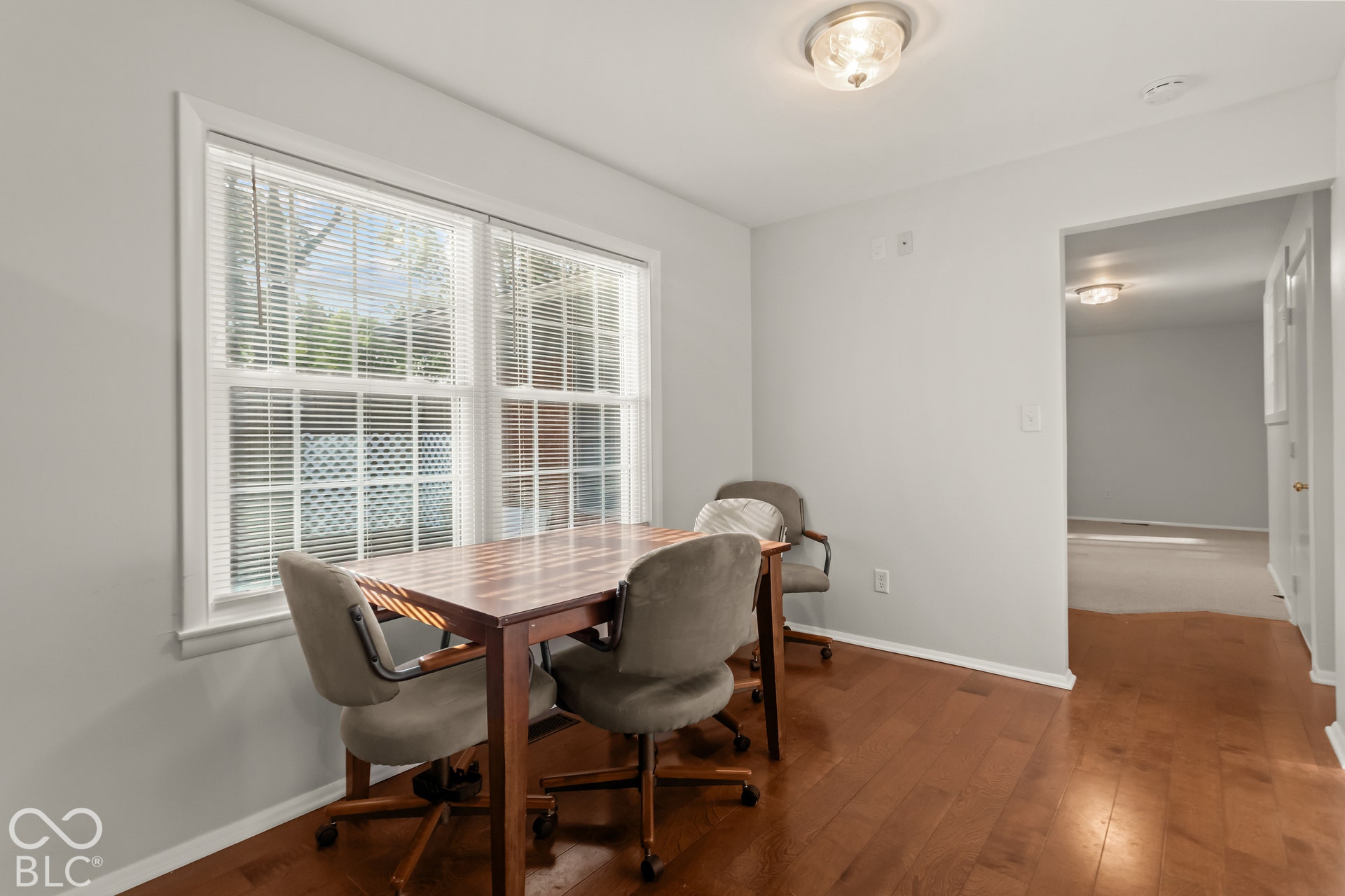 Wood-finish flooring with white trim