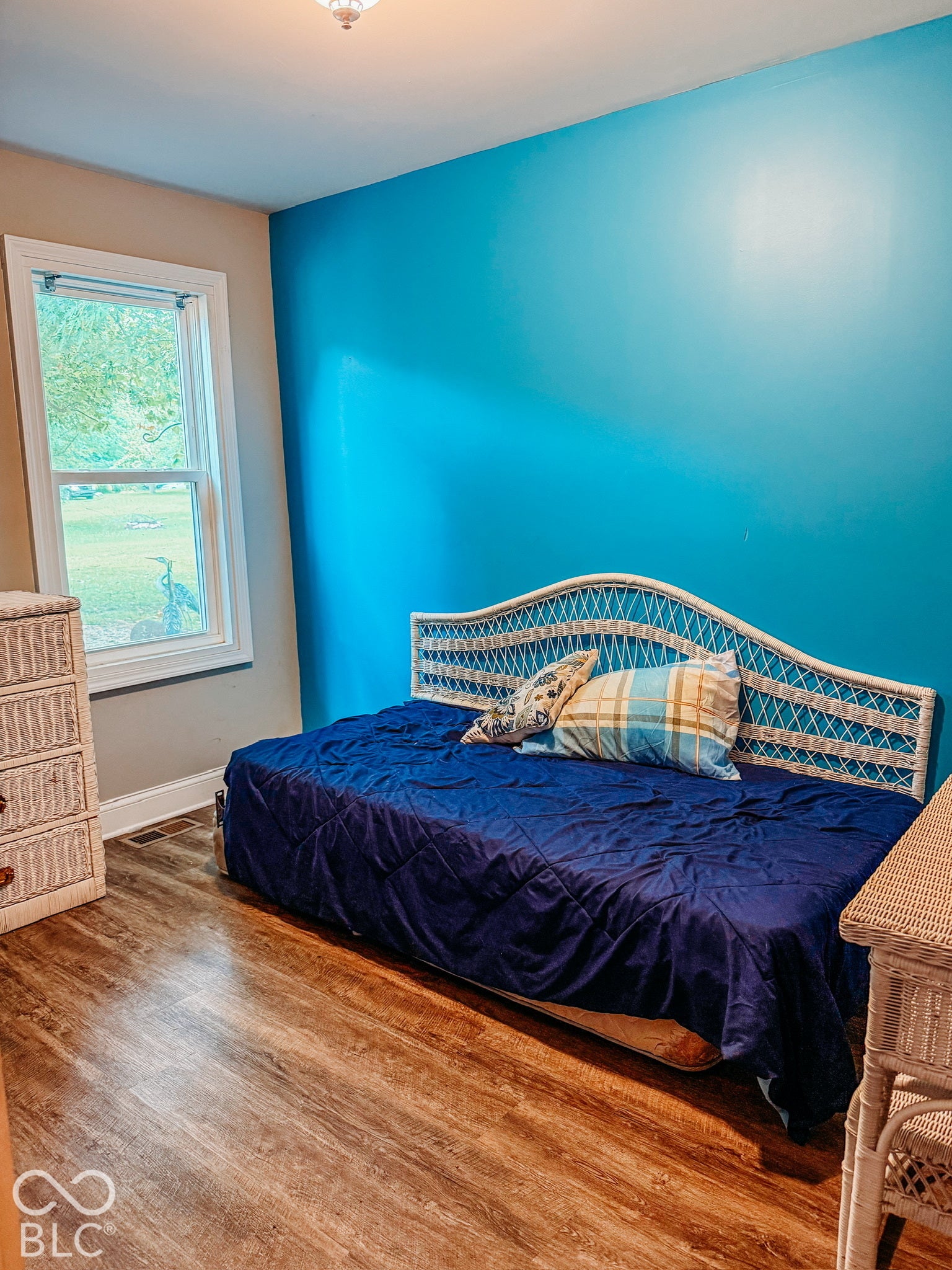 Wood-finish flooring with a single-pane window