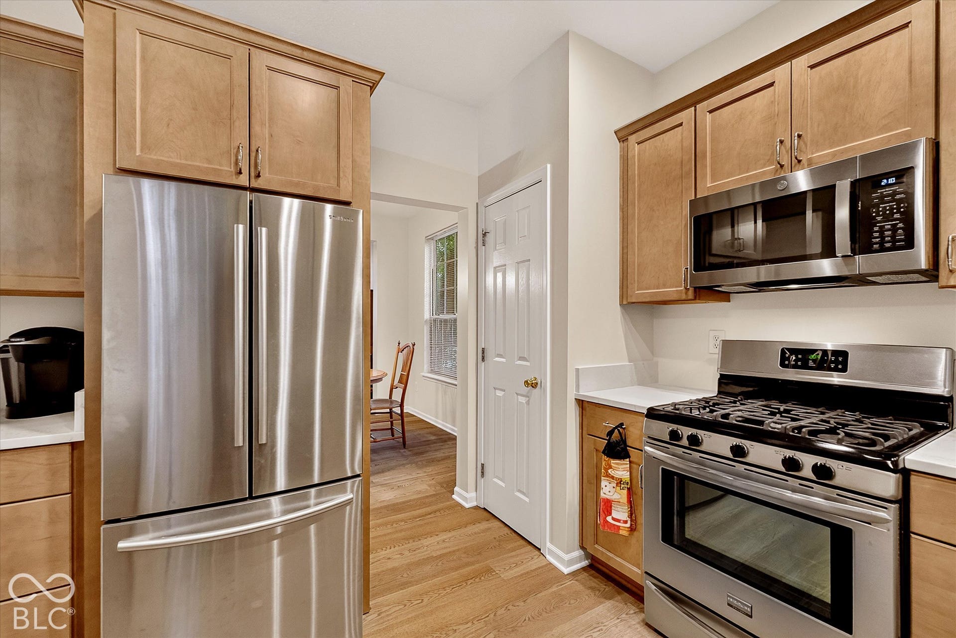 Kitchen flows into the dining room.