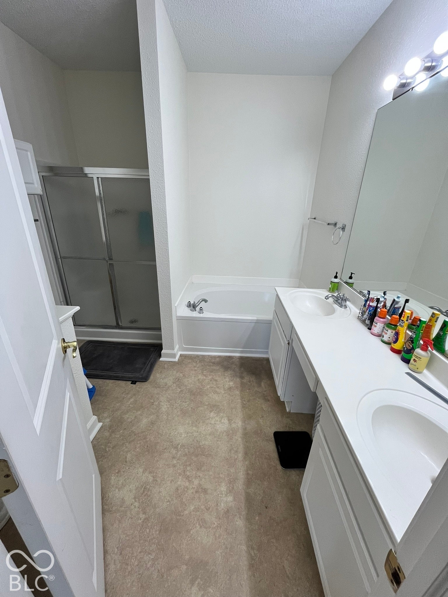 Primary Master Bathroom Separate Tub and Shower. Double Sink