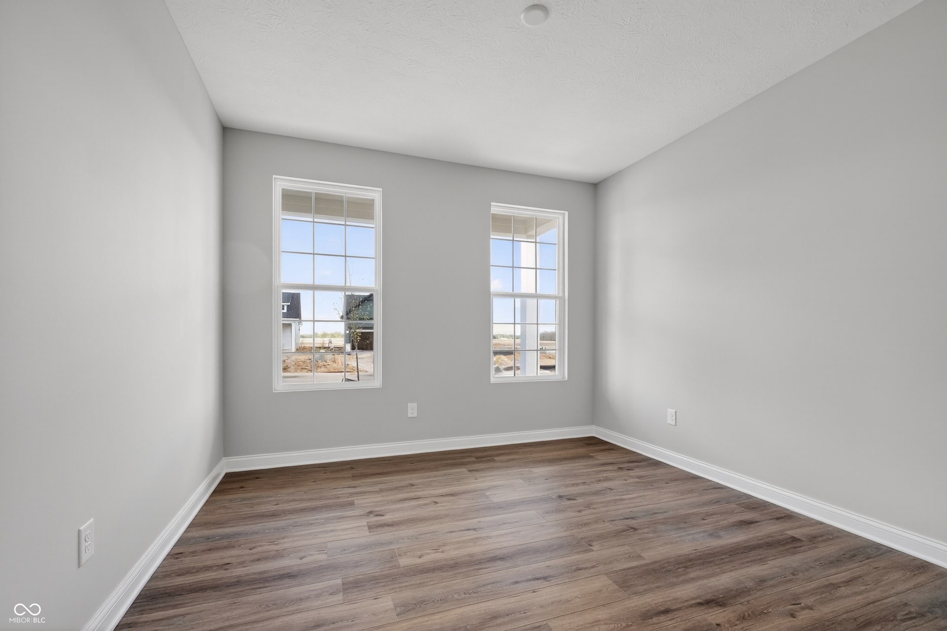 Virtually Altered - Similar Bedroom 2. This home has carpet in the bedroom.