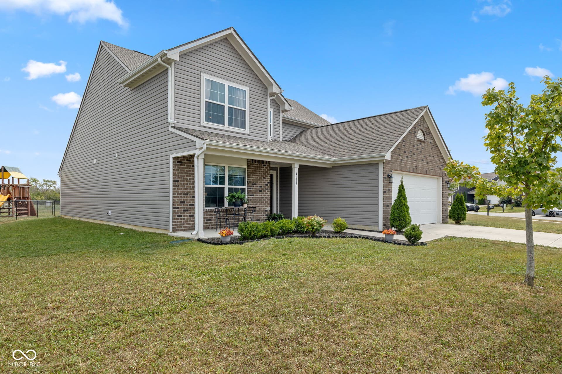 4643 Darla Court, Indianapolis, IN 46239 Two-story residence featuring a taupe siding and brick facade