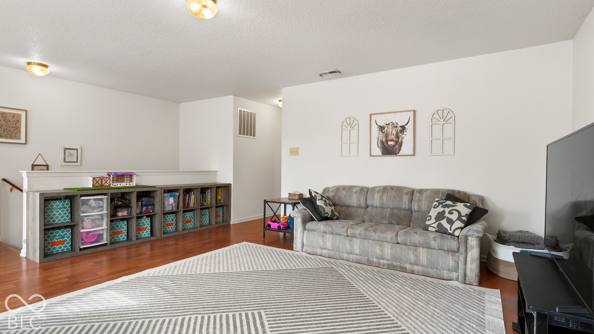 What a great area for a playroom OR extra living space