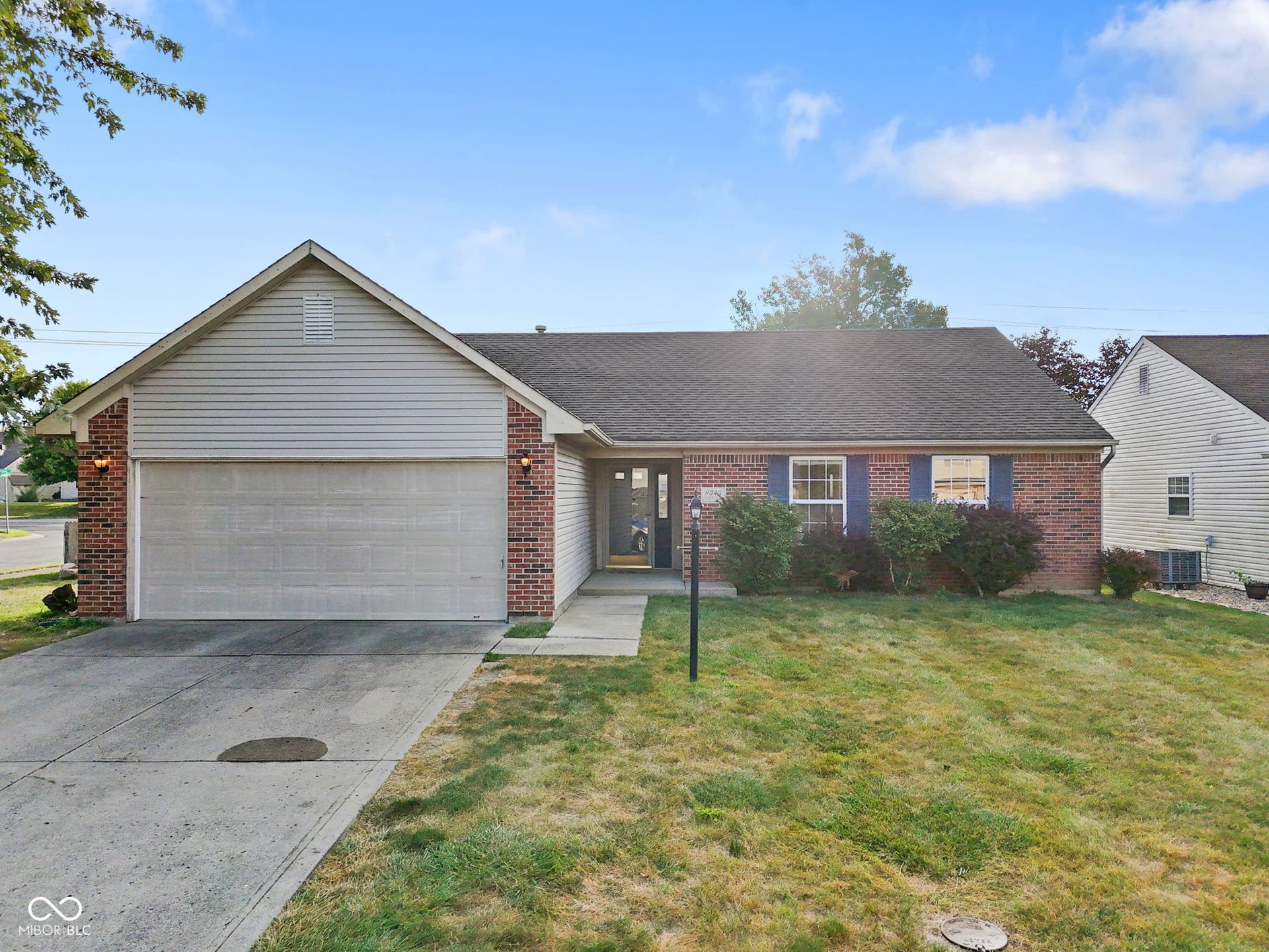 Welcome to this charming ranch home featuring a brick and vinyl exterior on a larfge corner lot.