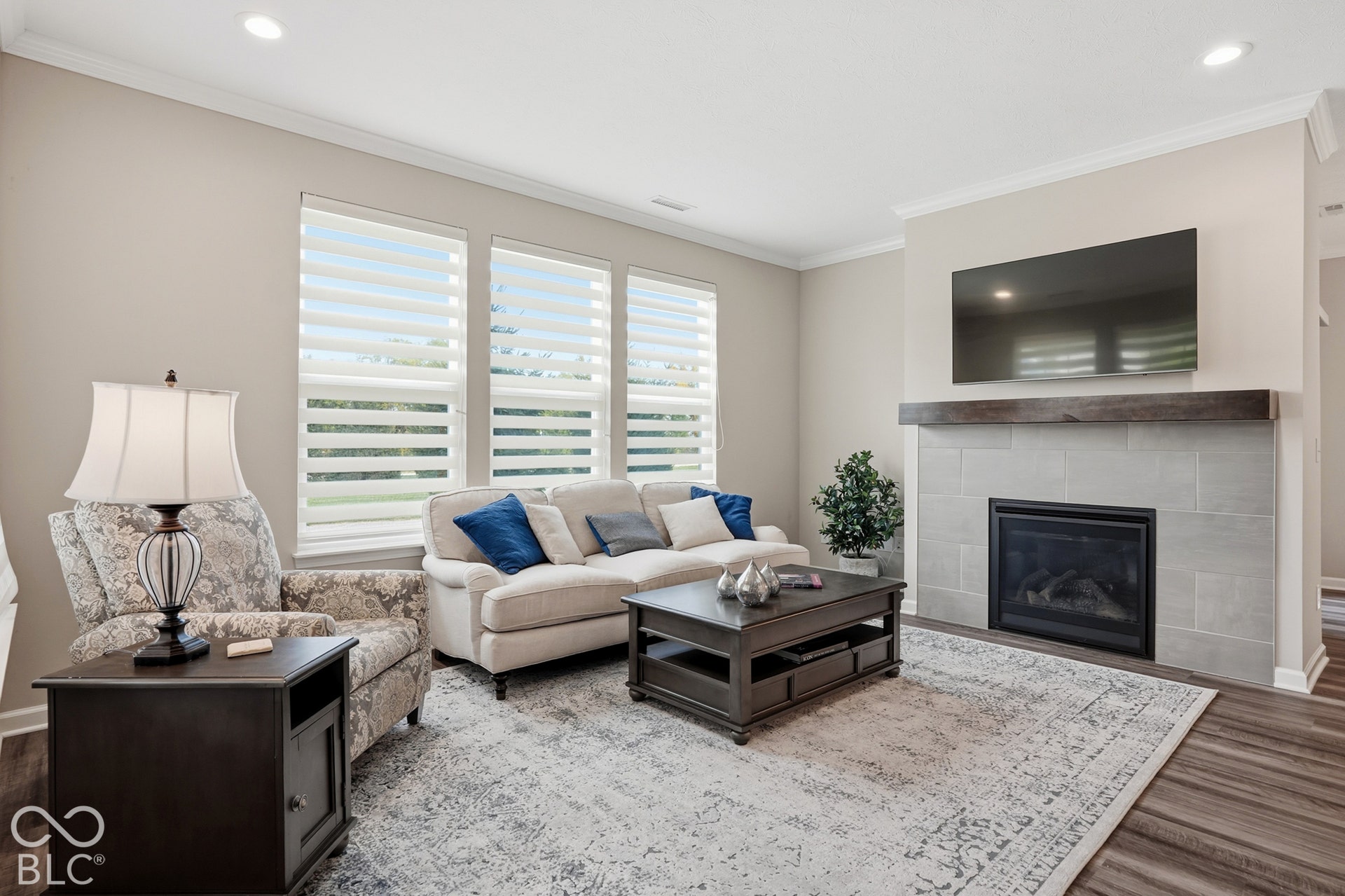Great Room with cozy fireplace is such an inviting room. . .