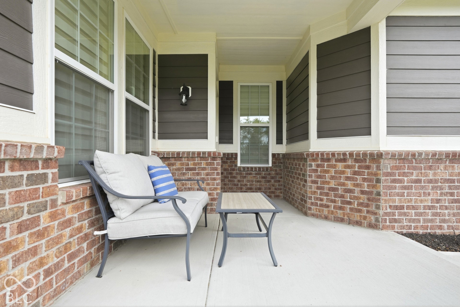 Front porch is large enough to accomodate a loveseat