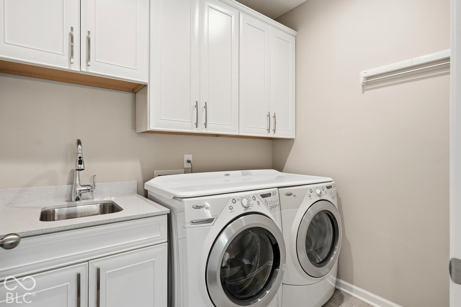 Lots of cabinetry for storage and sink is so handy