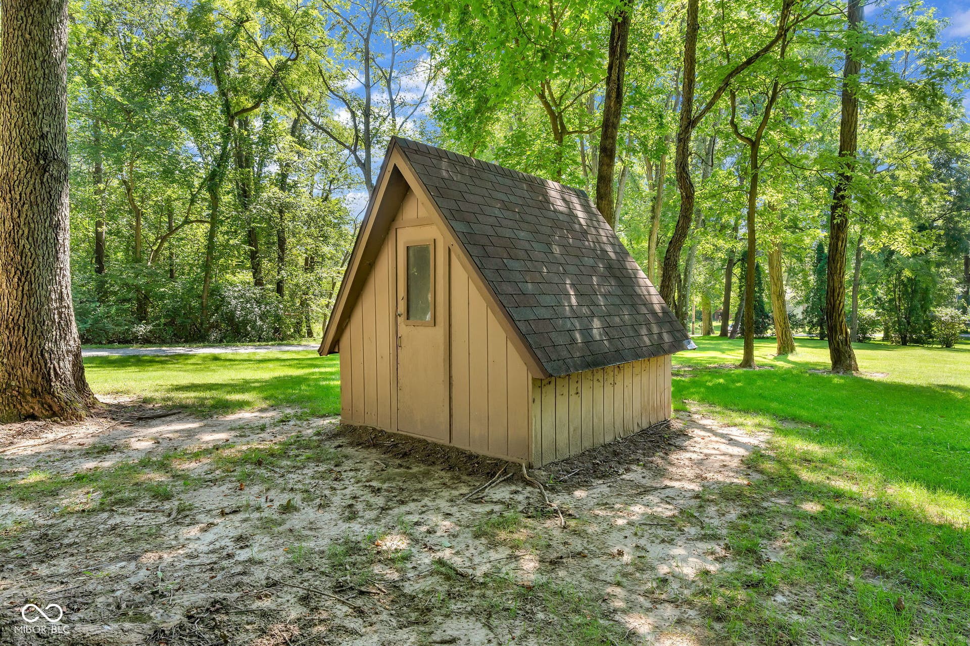 5432 W Whittier Drive, Knightstown, IN 46148 A-frame shed with wood siding and an asphalt shingle roof