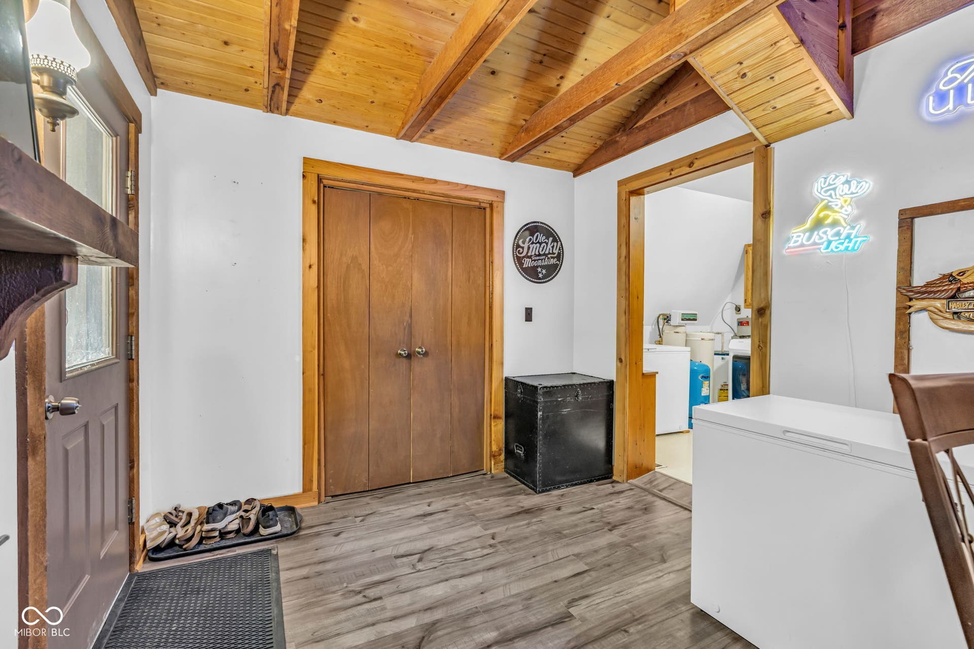 5432 W Whittier Drive, Knightstown, IN 46148 Exposed wood beam ceiling, wood-finish flooring, wood paneled doors, and interior wood trim