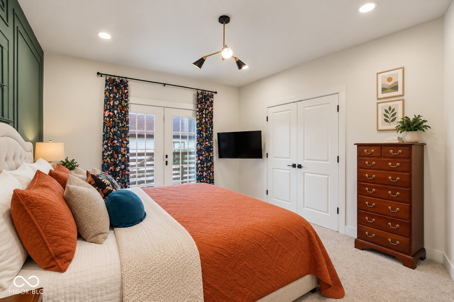 Recessed lighting, double panel doors, white interior doors, decorative wall trim, and a contemporary ceiling fixture