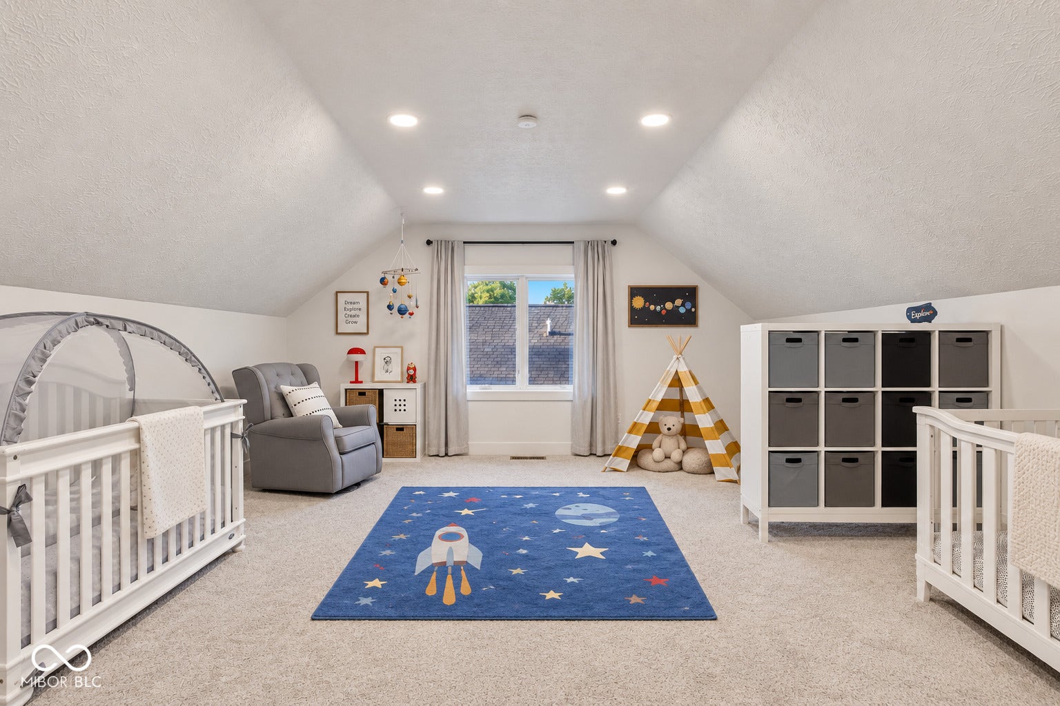 Bedroom 4: also could be used as a loft, with vaulted ceiling with recessed lighting, light-toned carpeting, and a window with white trim