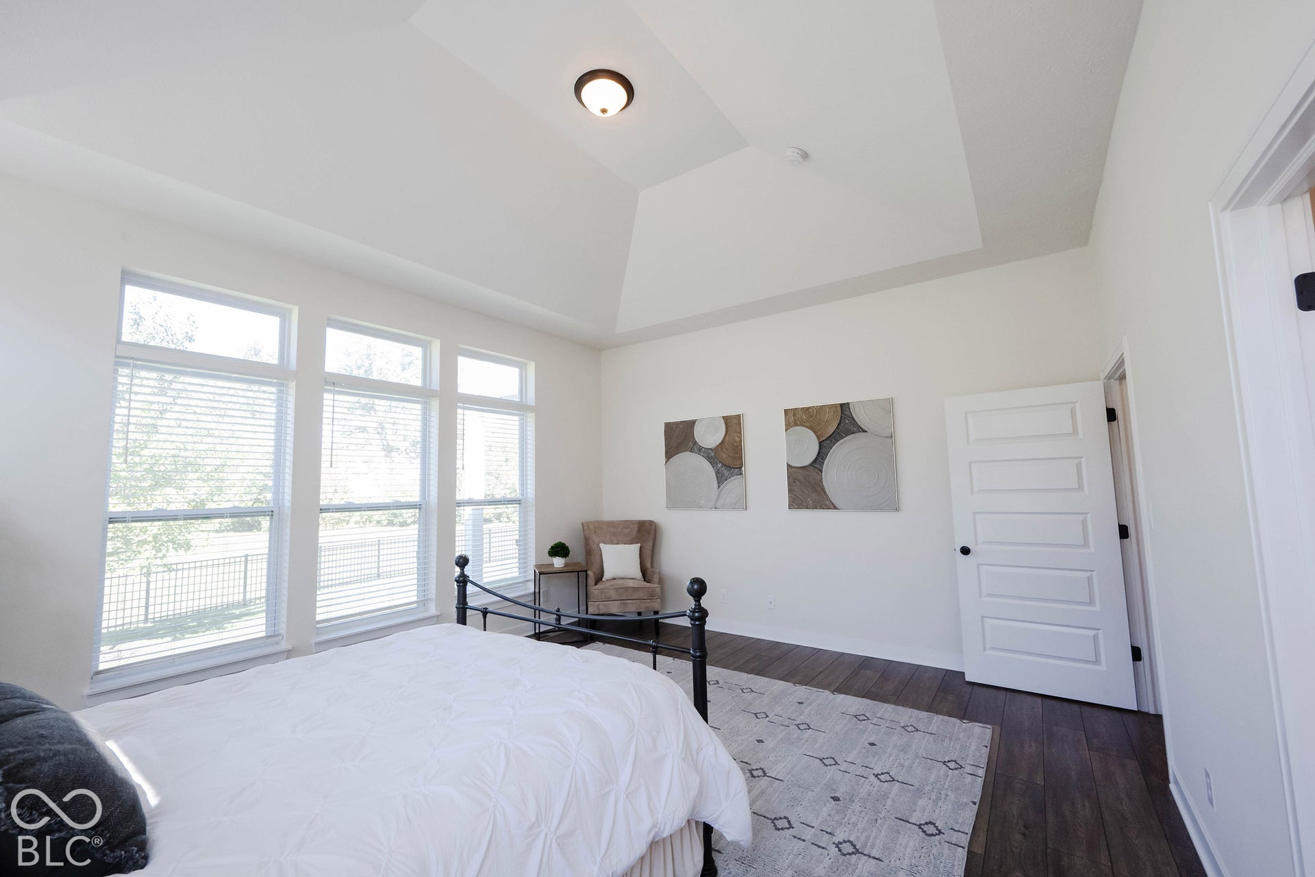 11614 Platt Street, Noblesville, IN 46060 Large windows give views of the private backyard and fill the room with natural light.