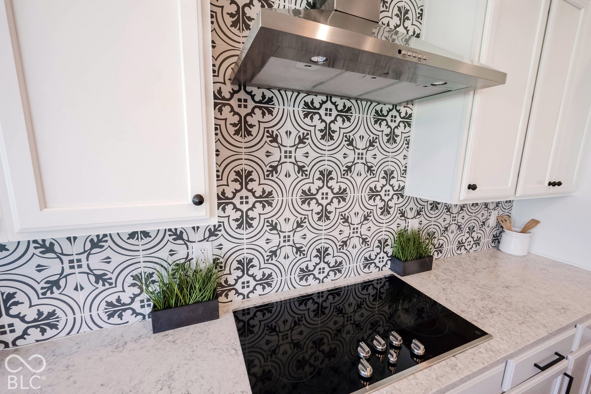 11614 Platt Street, Noblesville, IN 46060 White cabinets, quartz counter tops, and a classy tile backsplash complete the kitchen and allow you to cook in style! space!