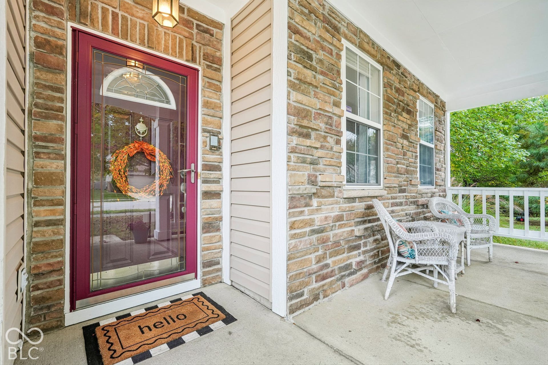 Covered front porch welcomes guests