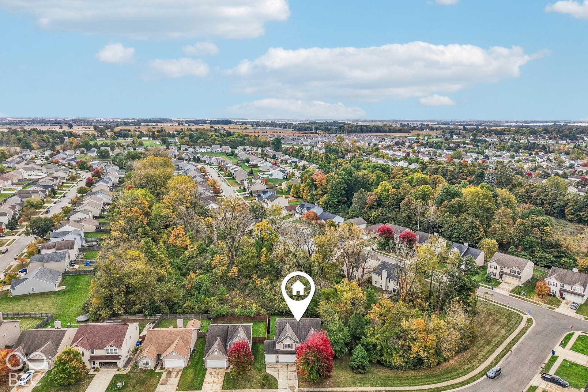 5831 Long Lake Lane offering privacy, 3-car garage, and a modern open floorplan