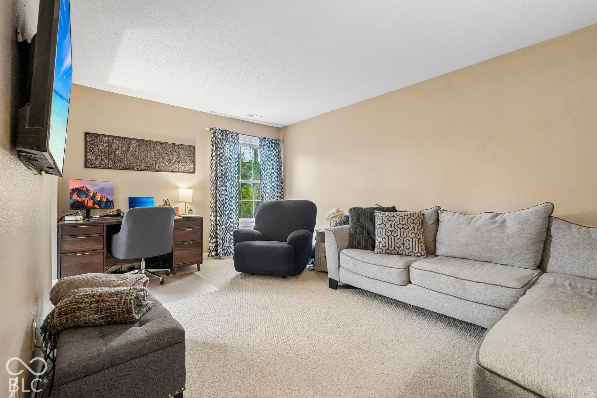 Sitting room in the primary suite provides the perfect retreat, 2nd office, or nursery
