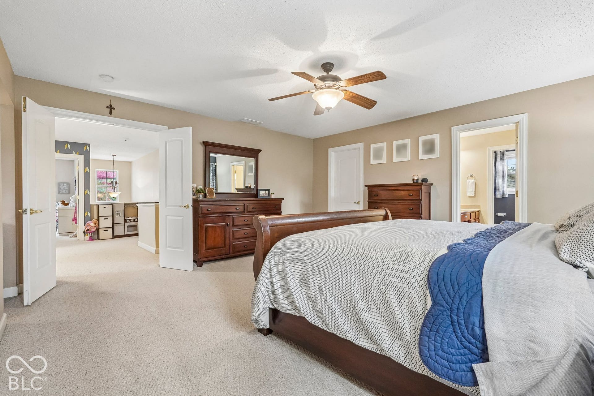Sitting room in the primary suite provides the perfect retreat, 2nd office, or nursery