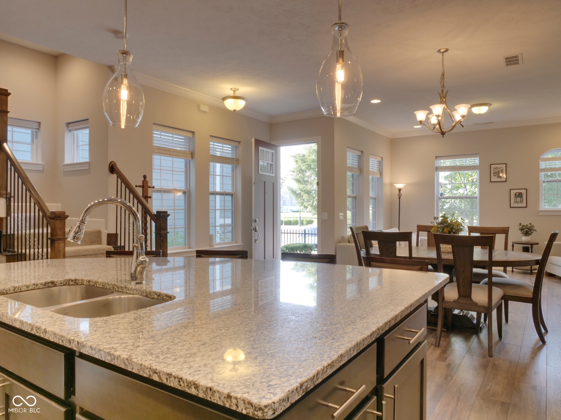 Kitchen island with granite countertops and double basin sink