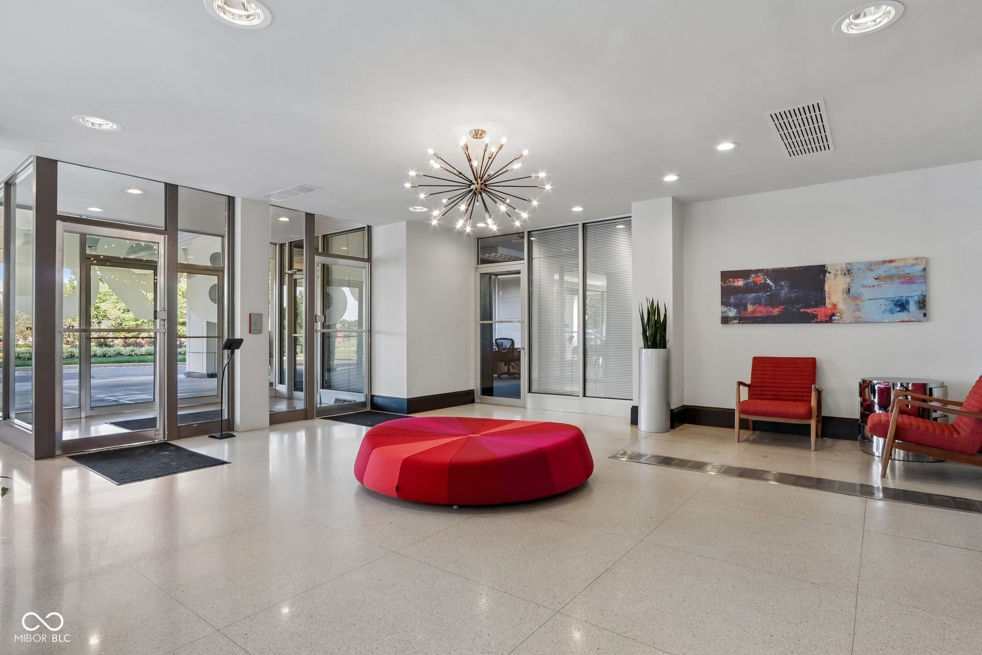 West Building: Polished tile flooring with dark accent strips