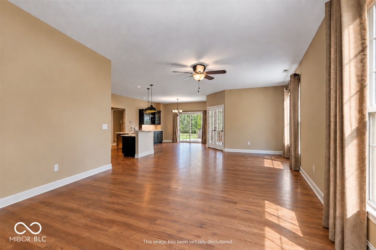 Note: Virtual staging edit to remove furniture and show the space in the room.