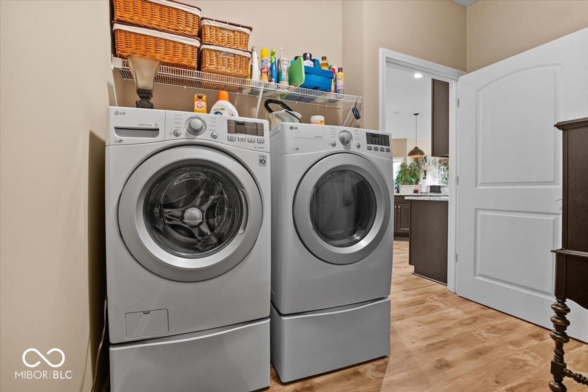 Washer & Dryer remain with home. 2 car garage w/ extra bump out space for storage/fridge