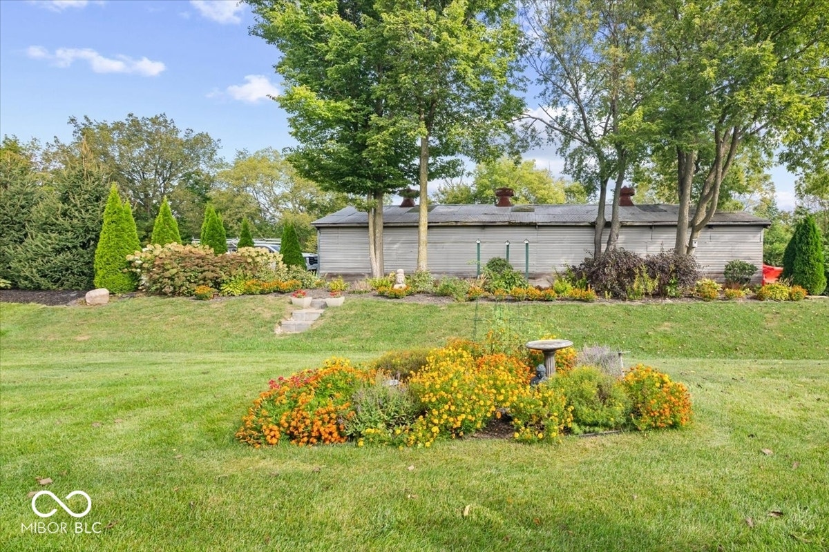 Enjoy the private yard and all the extra private landscaping space - arguably the best lot in the neighborhood.
