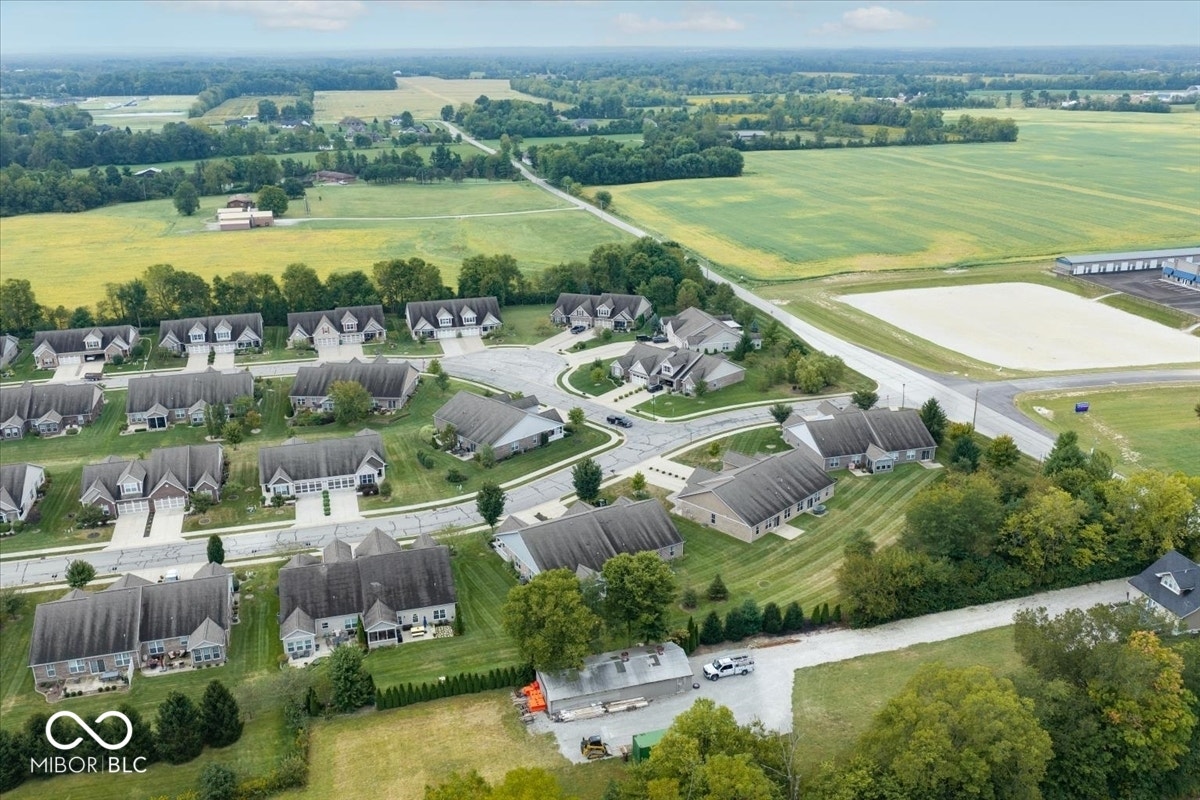 Community pool, paths and nearby golf