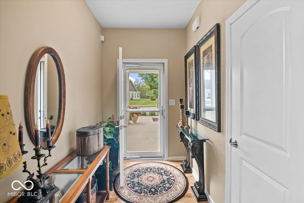 Enter to covered front porch.  Storm door allows great natural light.
