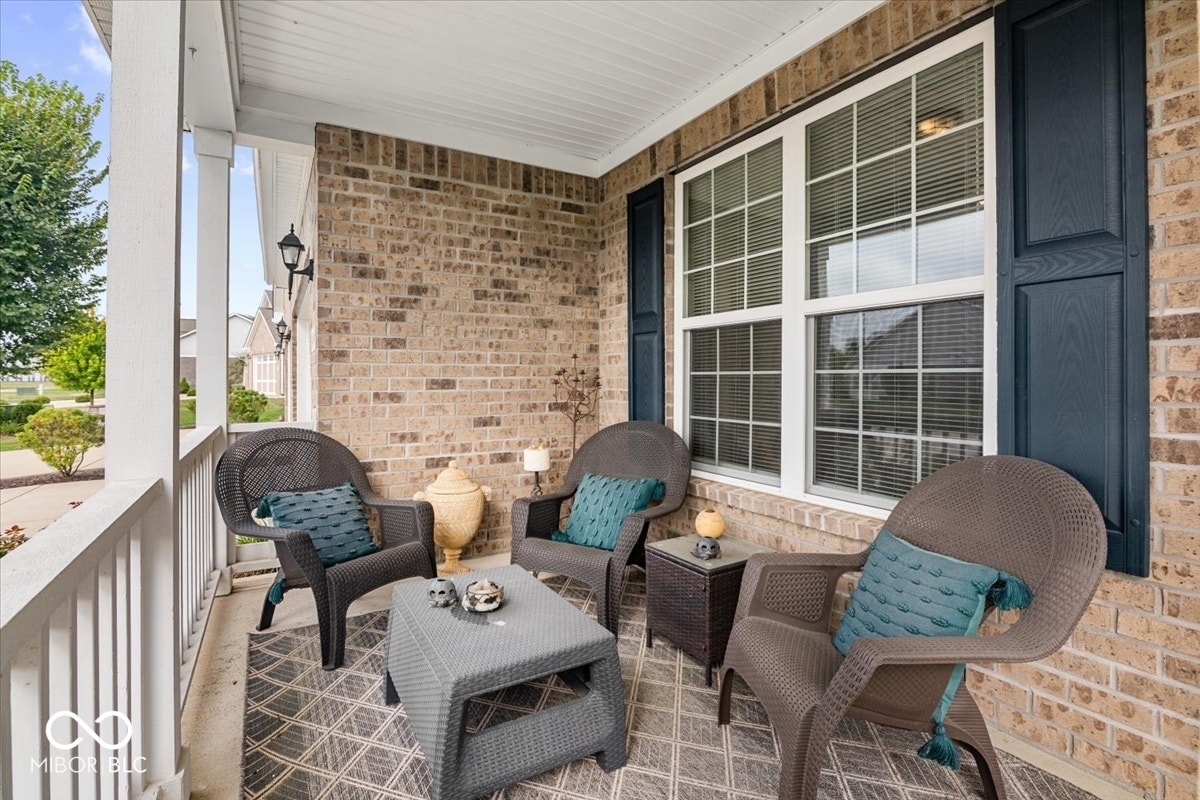 Covered front sitting porch - enjoy a coffee and relax