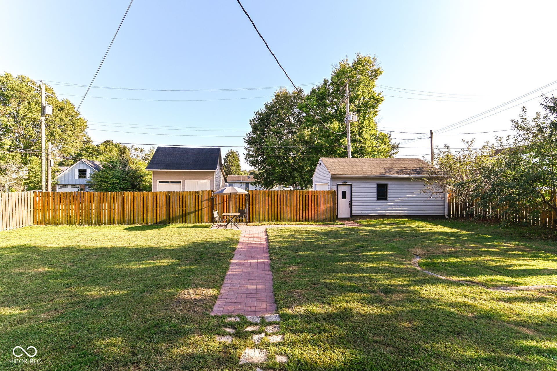 Expansive fully fenced backyard offers room to play, garden, entertain or simply enjoy the mature setting.