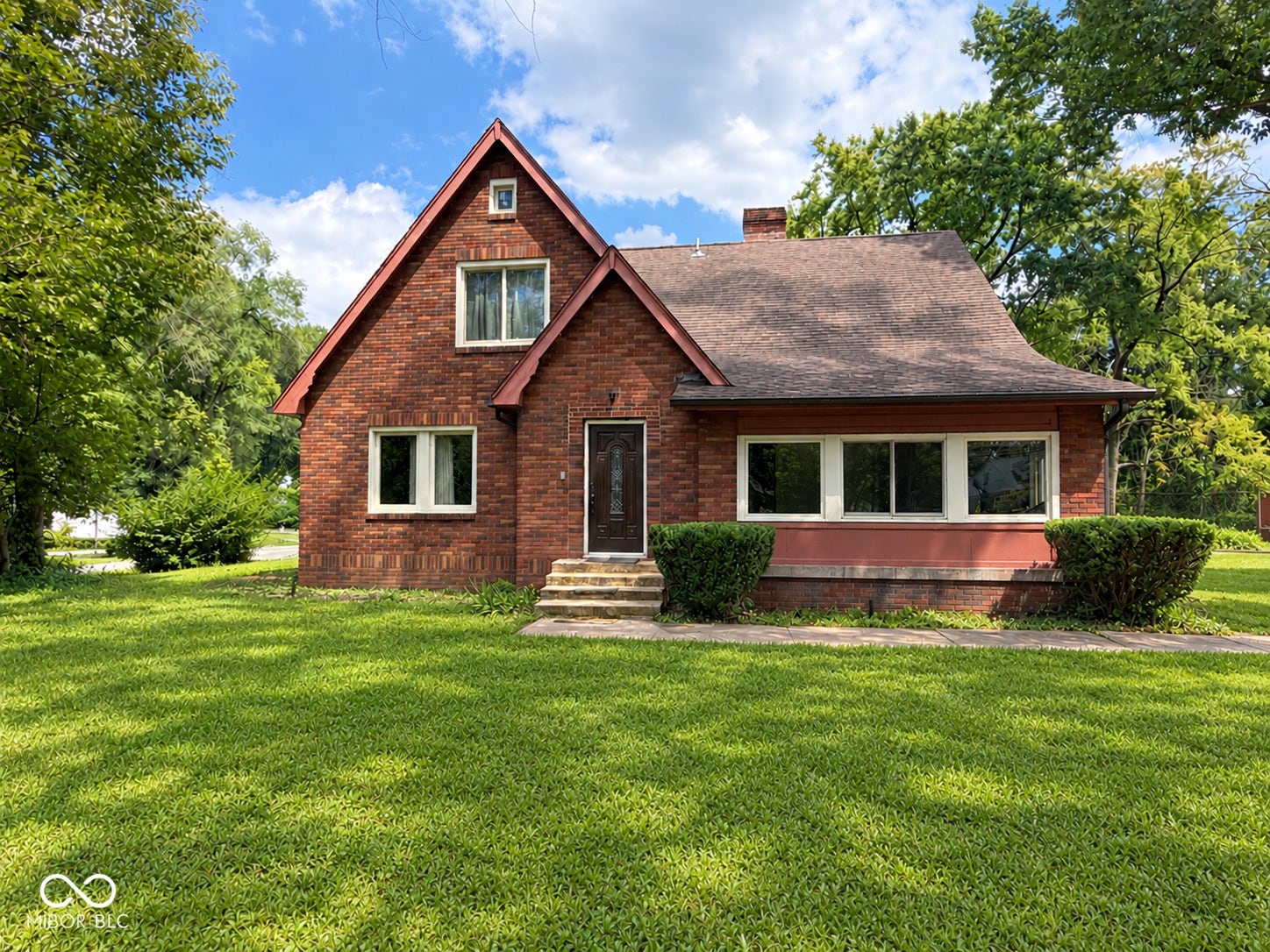 5145 Michigan Road, Indianapolis, IN 46228 Beautiful Brick Tudor that sits on 2 lots.