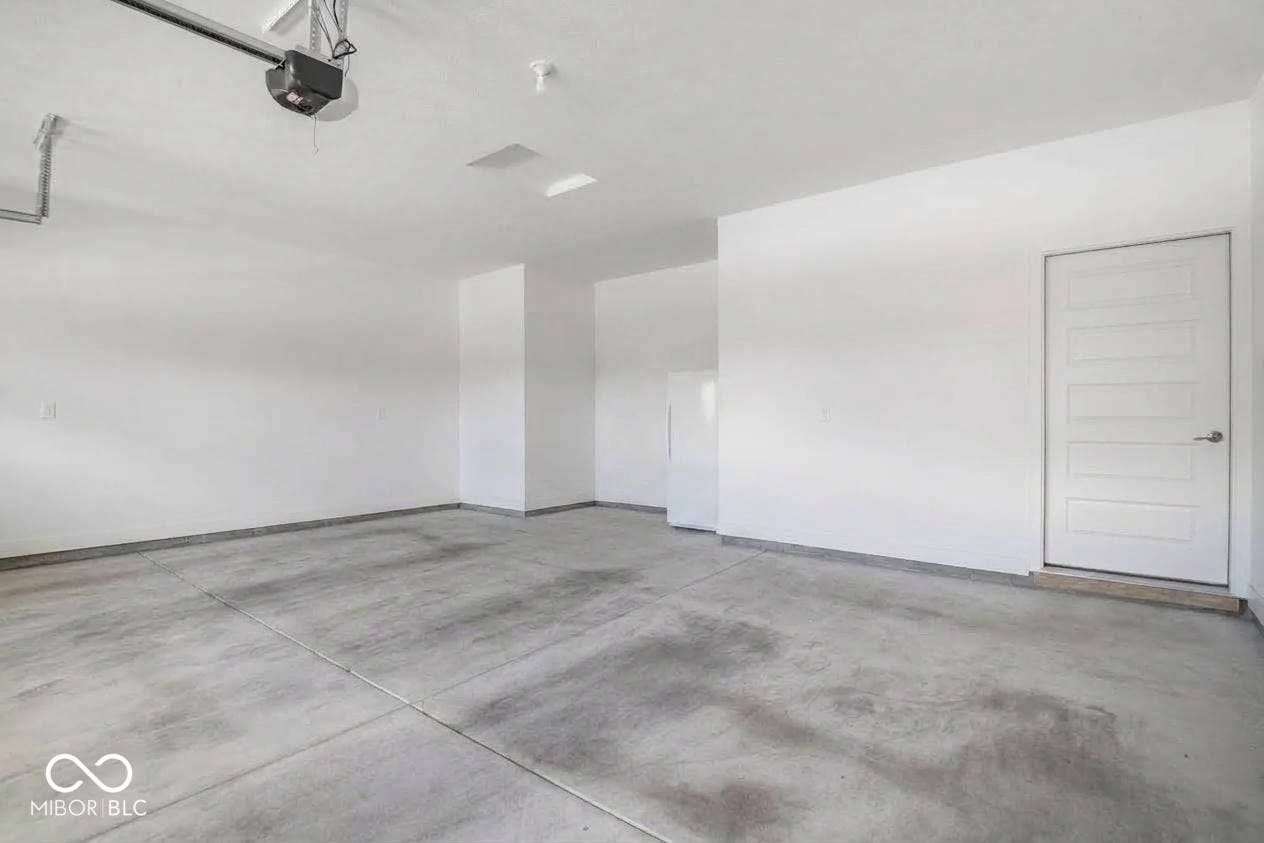Attached two-car extra-wide garage! Great for a shop or storage!