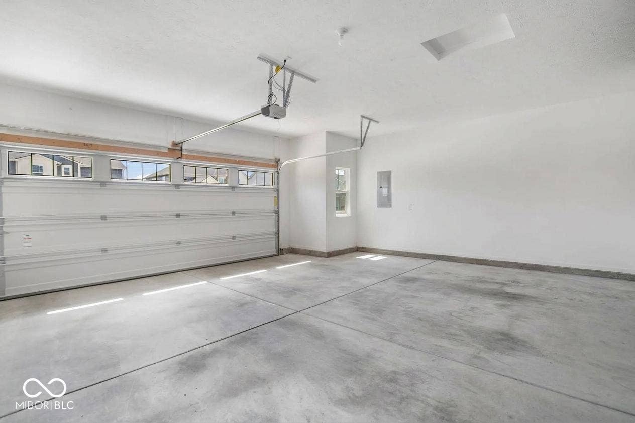 Attached two-car extra-wide garage! Great for a shop or storage!