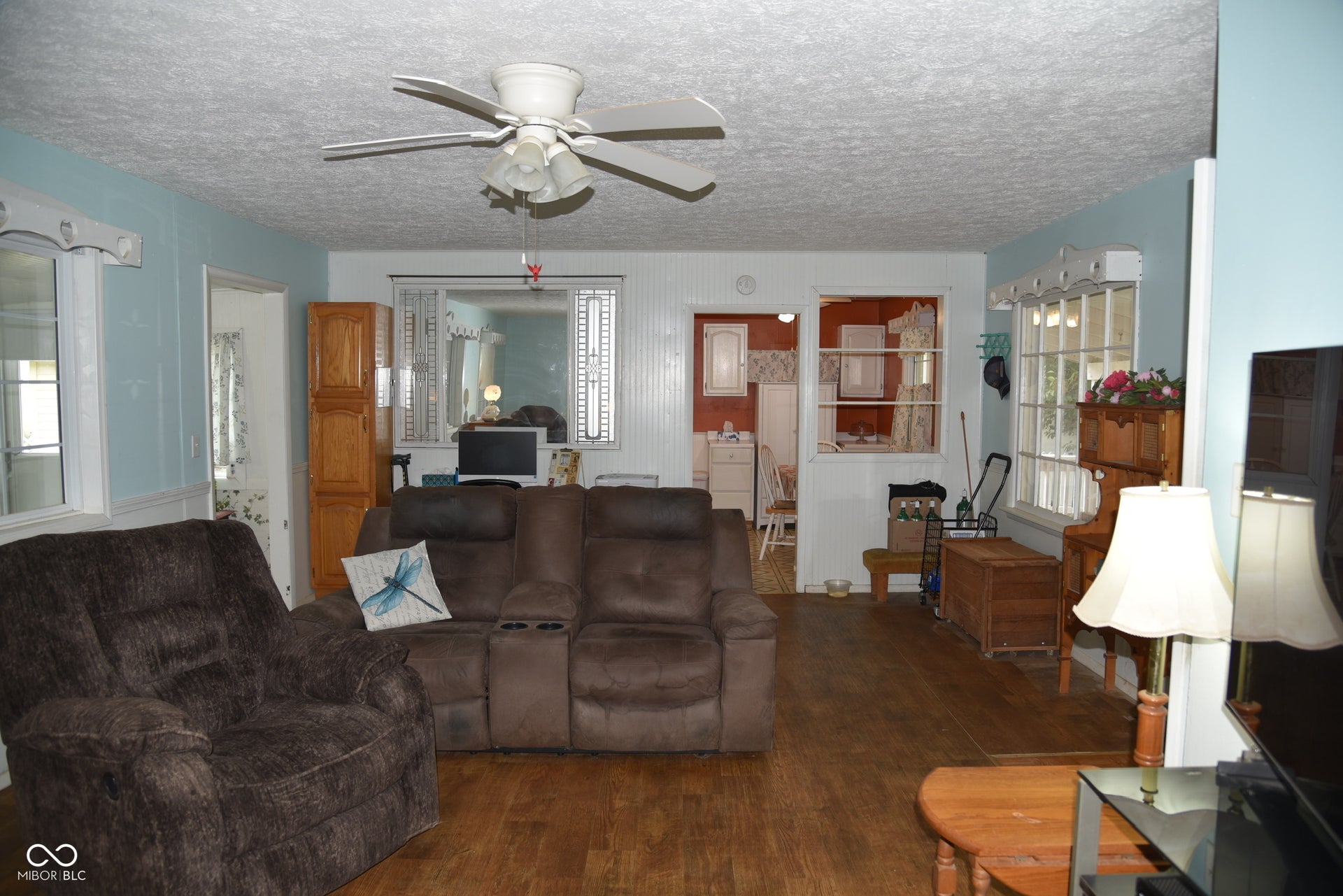 Wood-finish flooring throughout the space