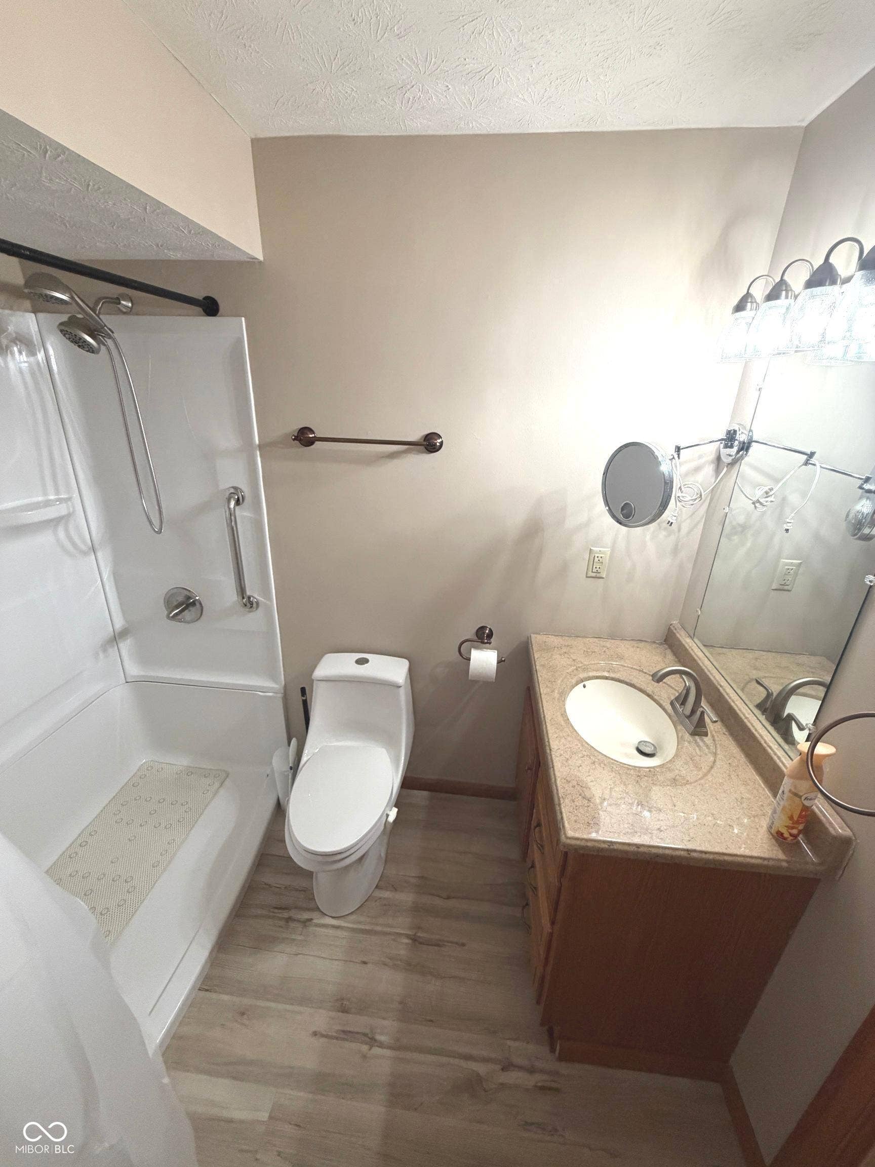 Step-in shower with grab bars on Main