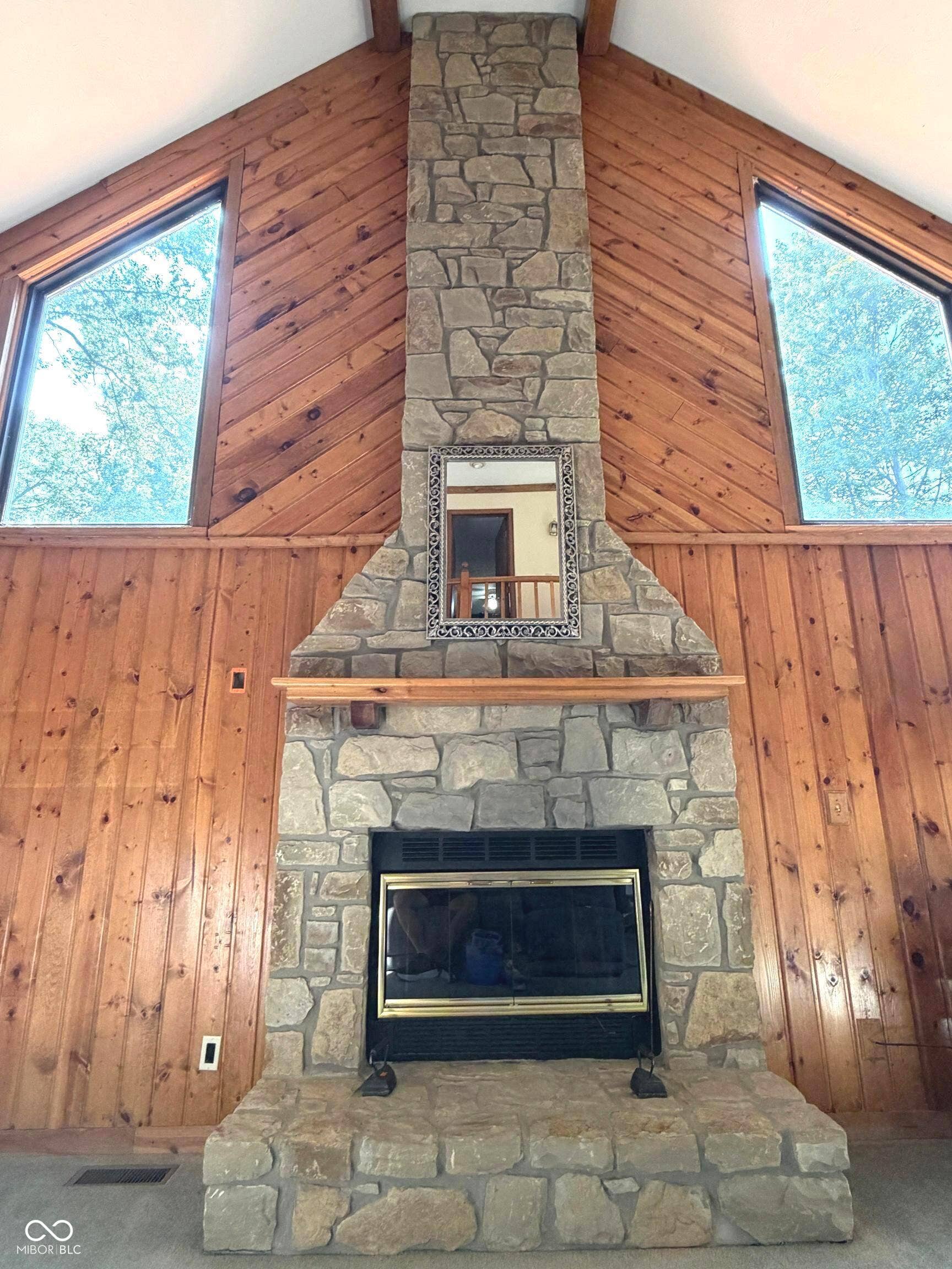 Stone fireplace converted to gas. POA signing on behalf of Sellers is not sure if this is in working order.