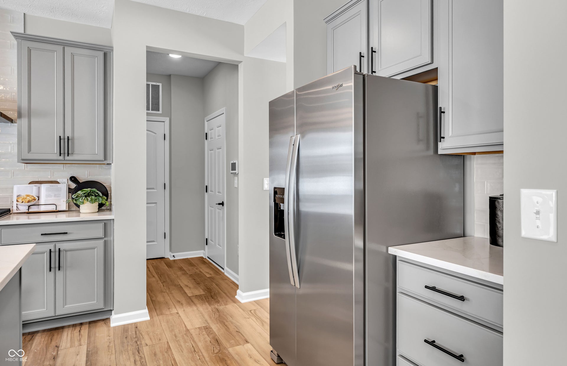 Virtually Altered - Similar Model. This home has stained cabinetry.