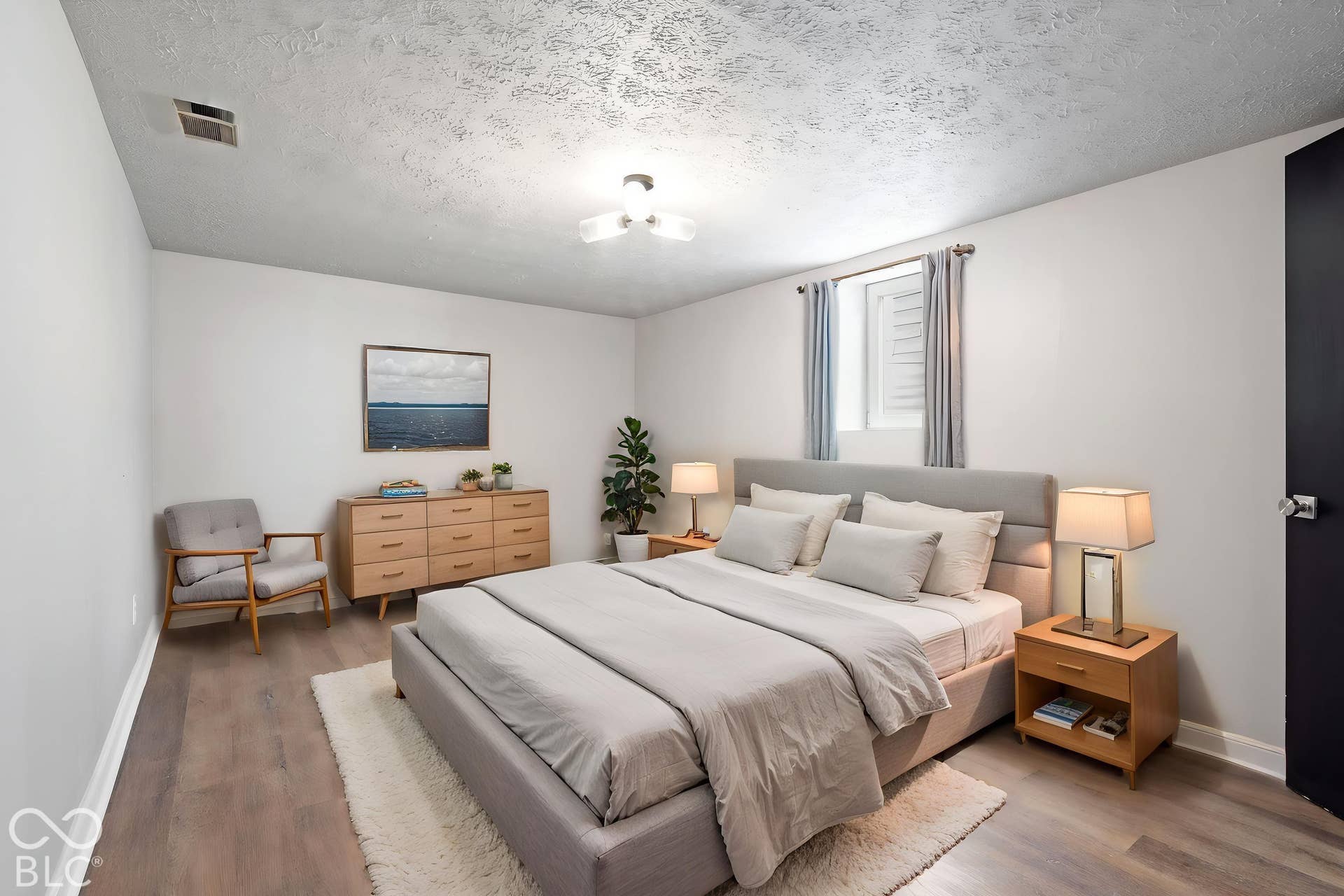 4911 Rosslyn Avenue, Indianapolis, IN 46205 Virtually Altered - Virtually Staged Primary Bedroom