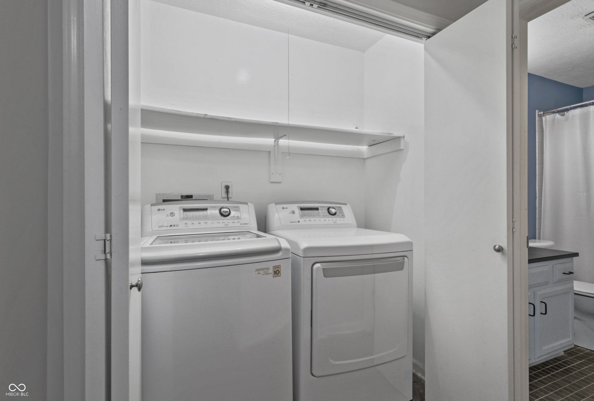 Virtually Altered - Built-in laundry closet with shelving