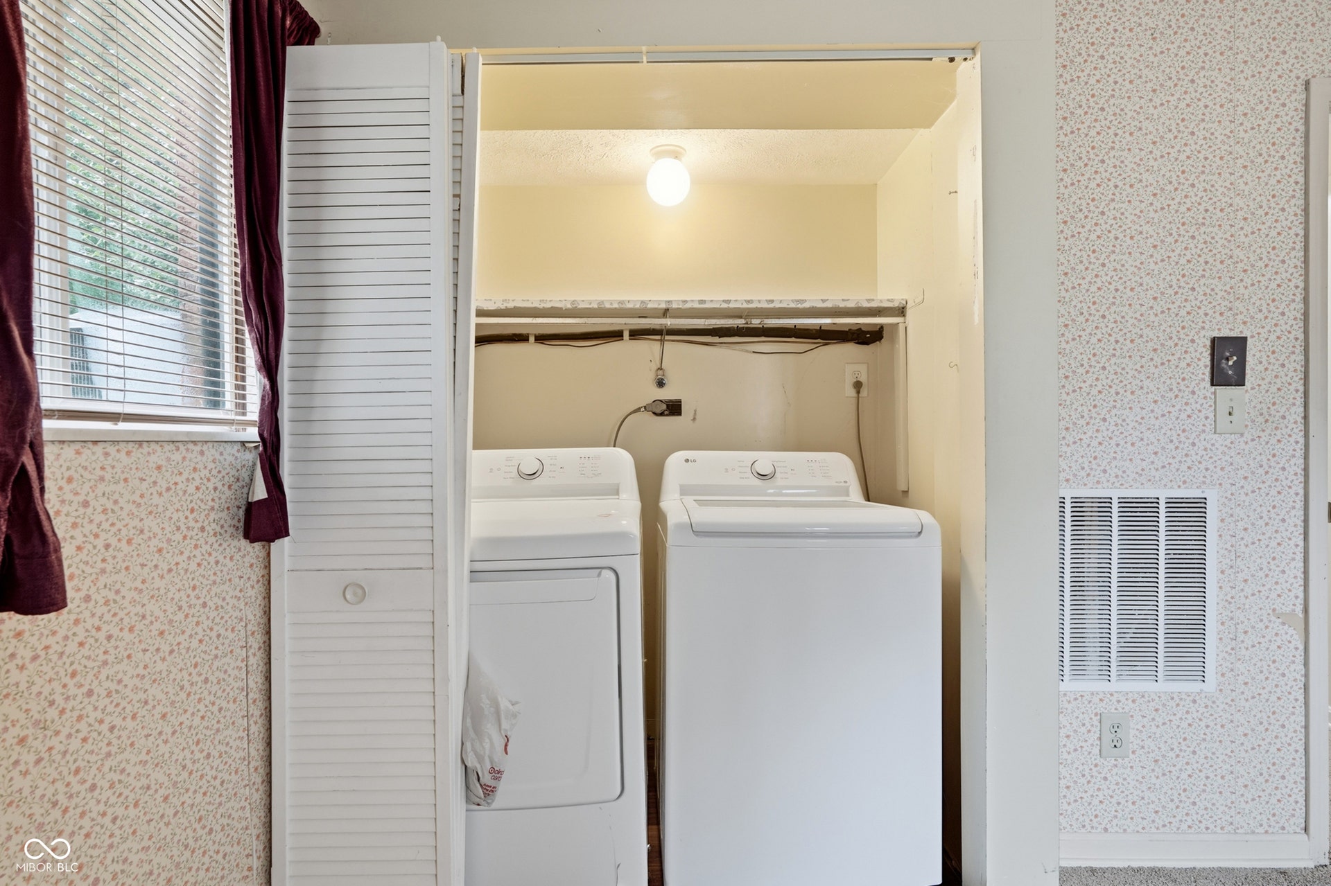 7927 Hoop Road, Indianapolis, IN 46217 Laundry closet in lower level family room/5th bedroom