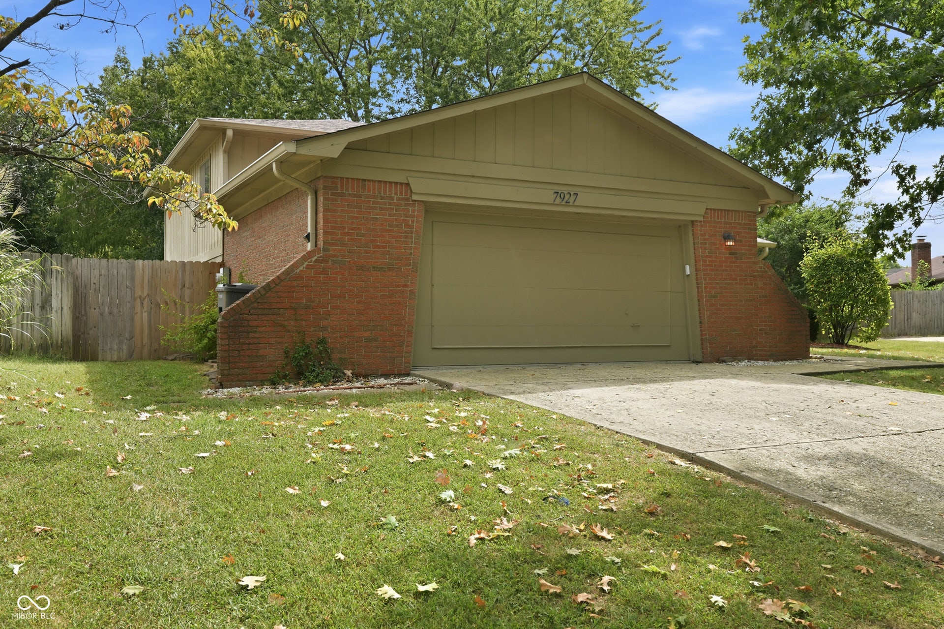 7927 Hoop Road, Indianapolis, IN 46217 Brick exterior with a gabled roofline