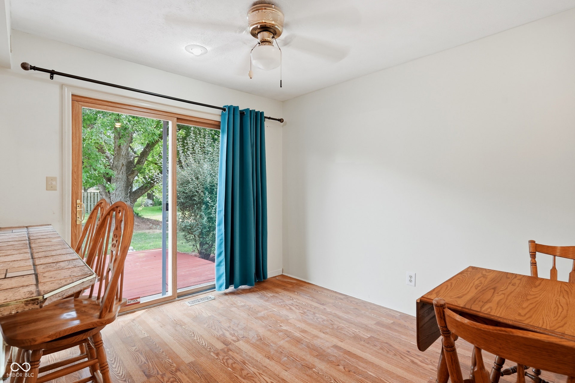7927 Hoop Road, Indianapolis, IN 46217 Wood-finish laminate flooring, recessed lighting, and a ceiling fan