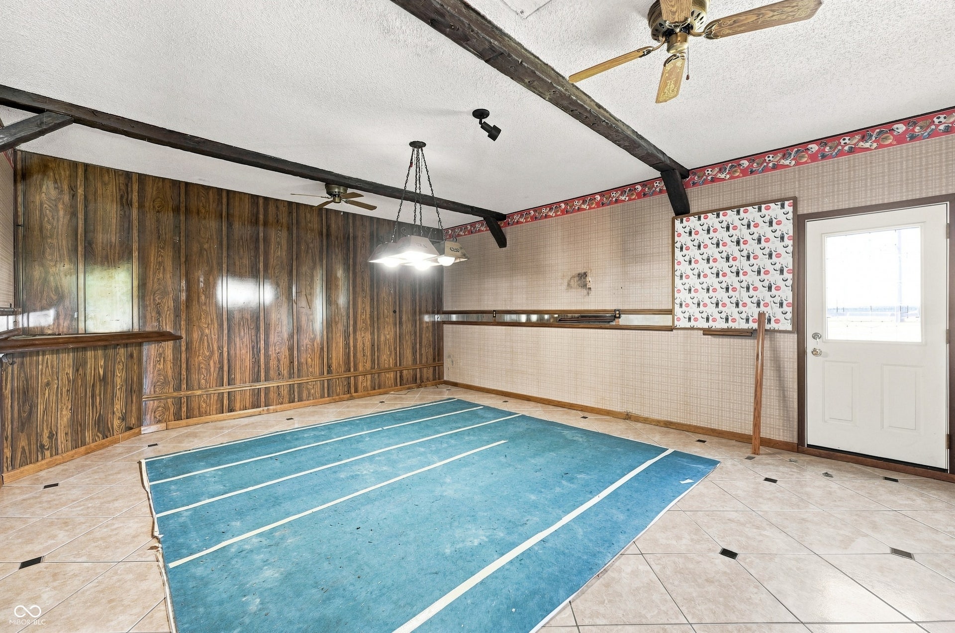 19 x 18 Game Room former garage, can be converted back if desired.