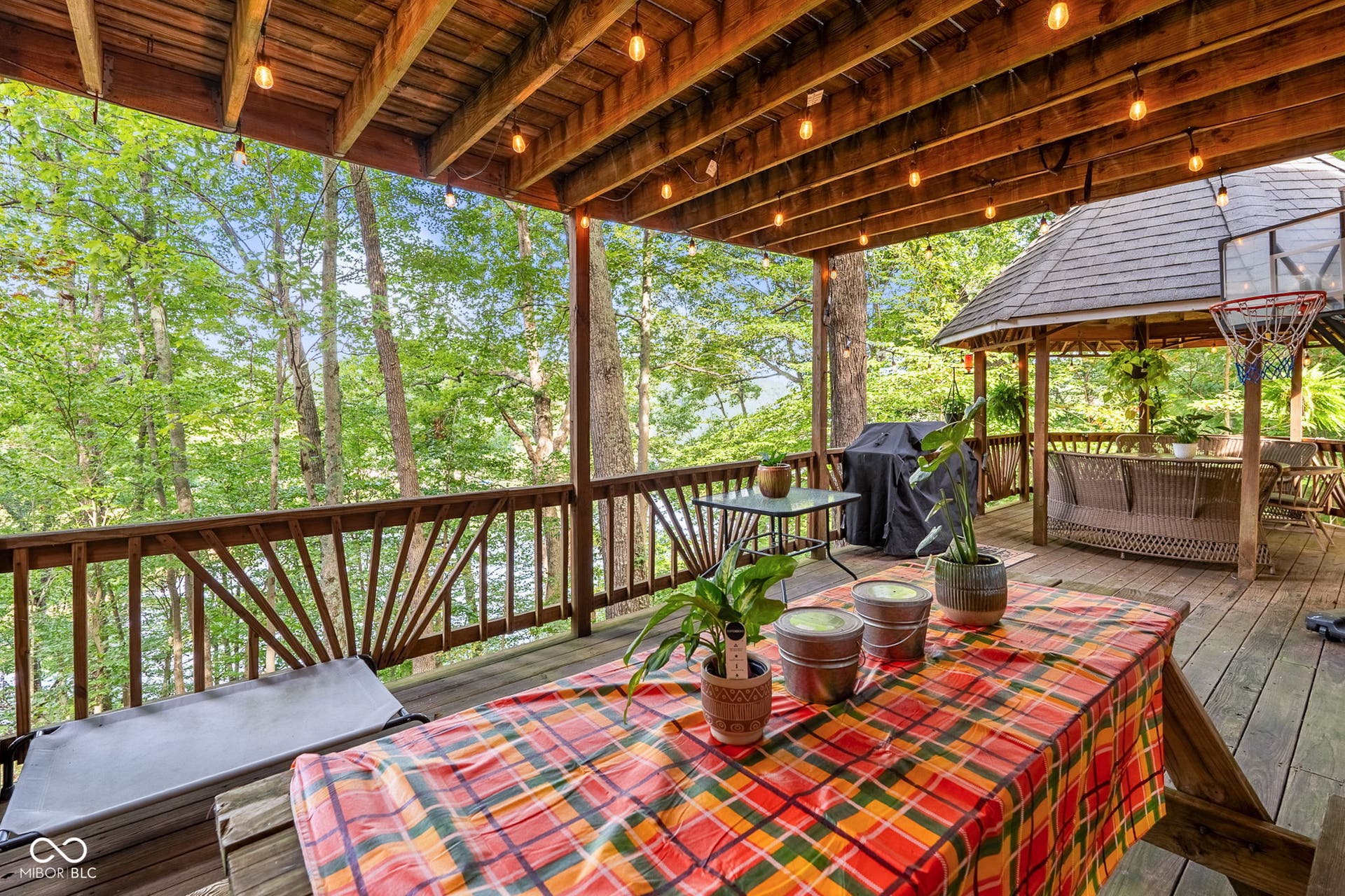 Spacious wood-finish deck with ample outdoor space