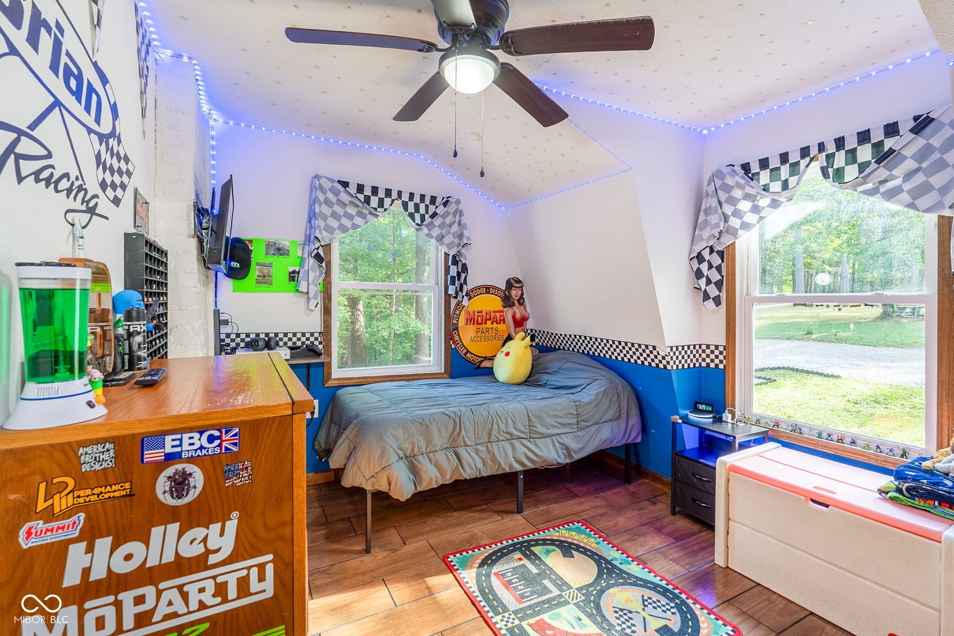 Wood-finish flooring, ceiling fan, and dual pane windows