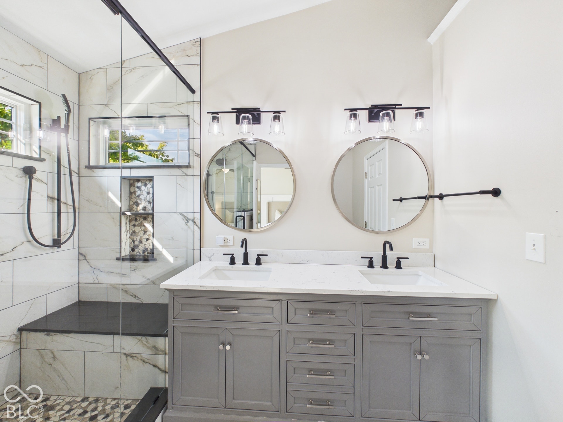 Dual vanity with undermount sinks and matte black fixtures