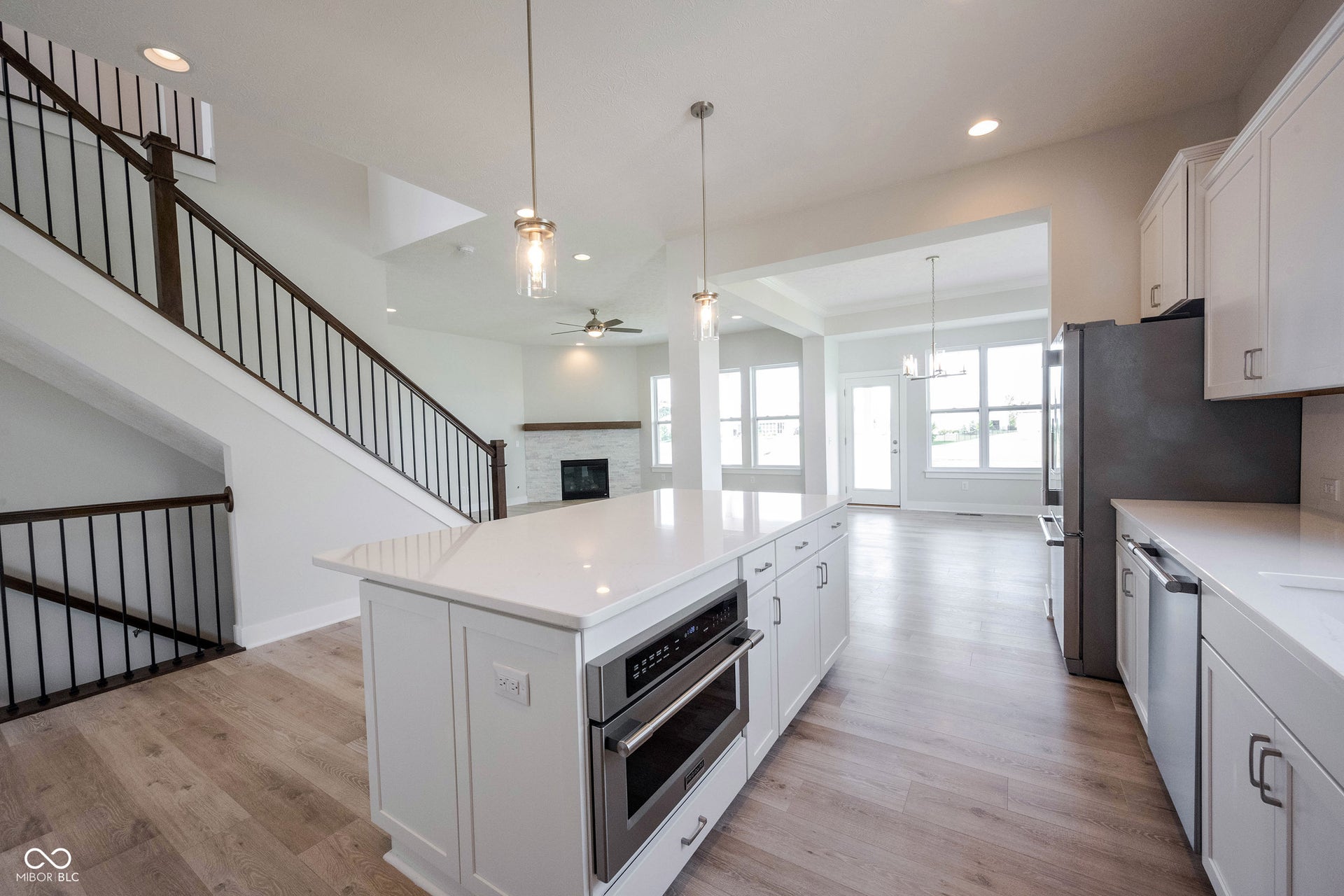 The kitchen island holds the microwave