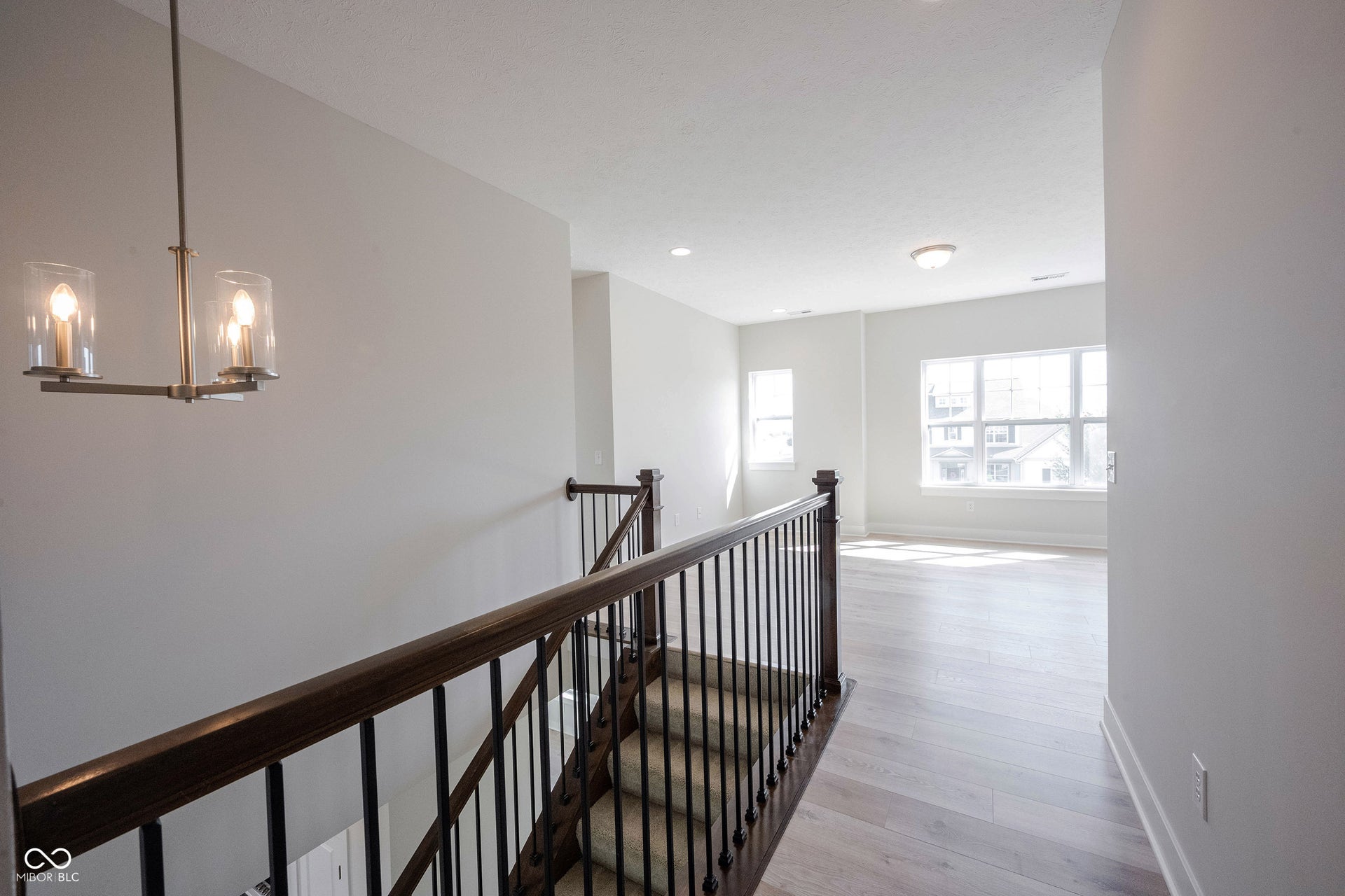 Down the hallway from the loft leading to the back of the home is the 3rd bedroom and 3rd full bath.