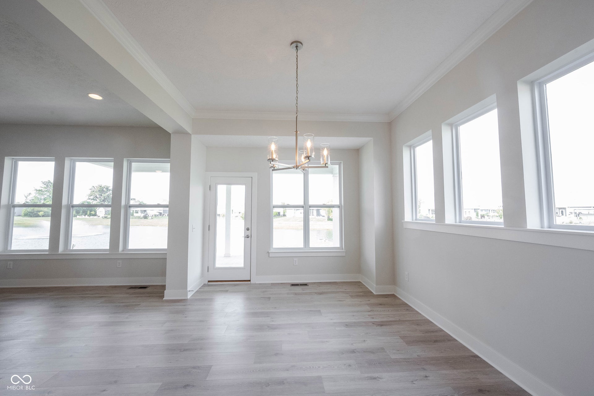 Another view/angle of the dining room.  You can see the pond view from all the back windows.