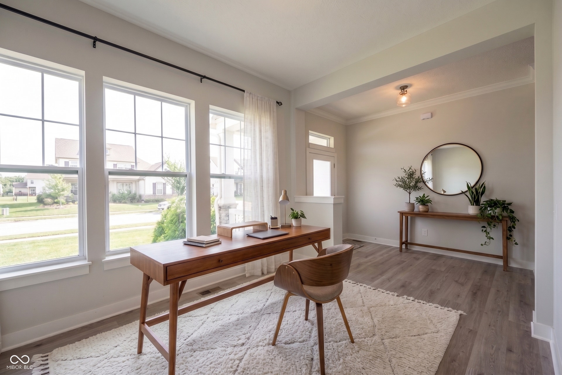 Front office/flex room - This photo is virtually staged